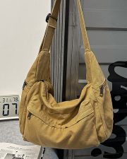 ユニセックスキャンバスショルダーバッグ 収納力抜群 リラックスカジュアル 通学対応 - 画像 (15)