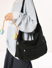 ユニセックスキャンバスショルダーバッグ 収納力抜群 リラックスカジュアル 通学対応 - 画像 (5)